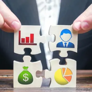 fpkdl.com_960_1761647218_businessman-collects-puzzles-symbolizing-individual-elements-attributes-doing-business-project-management-good-planning-organization-process-creation-business-model_72572-