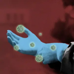 fpkdl.com_960_1761649183_doctors-gloved-hand-contaminated-with-coronavirus-background_53876-107445