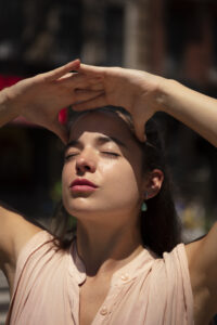 young-woman-tolerating-heat-wave-outdoors